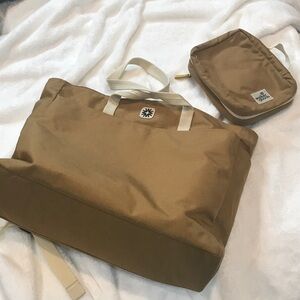 Versatile Tan Baby Weekender and cosmetic bag/Tote with Cream Handles